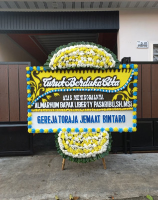 Papan Bunga Duka di Terjun